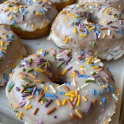 Hook And Press Donuts - The Vanilla Bean Funfetti, topped with natural rainbow sprinkles made with plant-based colors