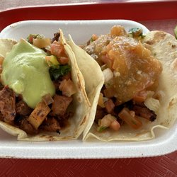 Hot Dogs El Chapin - 2 tacos al pastor with different salsas