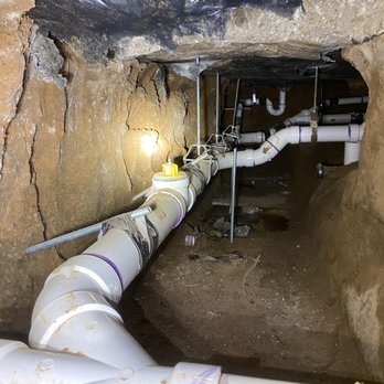 TD Plumbing - a pipe in the middle of a tunnel - Plumbing Near Me TD Plumbing - a pipe in the middle of a tunnel - Plumbing Near Me