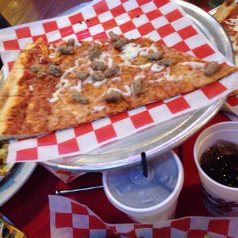 Brooklyn Heights Pizzeria - Giant cheese slice with added sausage. - New American Near Me - Leander, Texas