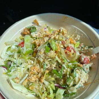 CAVA - a person holding a bowl of salad - Salad Near Me - Vienna, Virginia