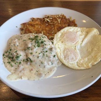 Sleepy Rooster Morning Kitchen - Biscuits & Gravy with hash browns and two eggs over easy - Breakfast & Brunch Near Me - New Albany, Indiana Sleepy Rooster Morning Kitchen - Biscuits & Gravy with hash browns and two eggs over easy - Breakfast & Brunch Near Me - New Albany, Indiana