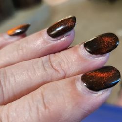 Elegant Salon - Good grief looks like they were just stuck on. In fact those stick on nails for 5$ has looked better.