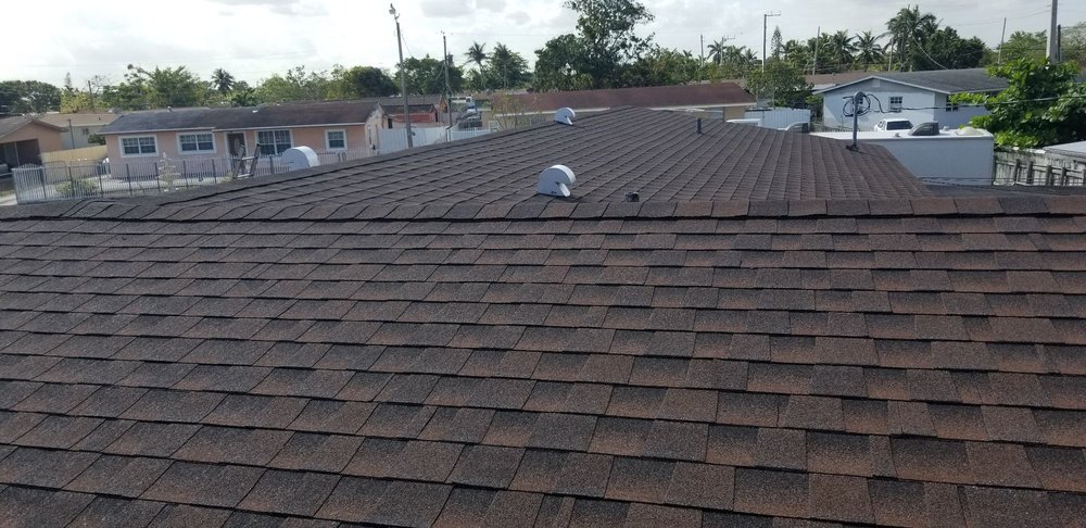 Slide of Priceless Roofing