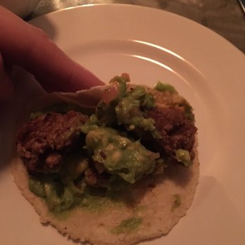 Swoon Rooftop - Chicharron and guacamole all happy inside a fresh and warm tortilla. - Mexican Near Me - Tulum, ROO