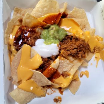 Taco Bell - Meaty nachos cheaper than nachos bell grande.  Opted for no beans, light sour cream, and guac - Fast Food Near Me - Daly City, California