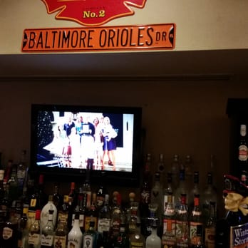 The Orioles Grille - a bar with bottles of liquor - Food Near Me - Baltimore, Maryland The Orioles Grille - a bar with bottles of liquor - Food Near Me - Baltimore, Maryland