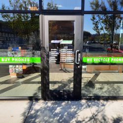 Cases 4 Phones - Front Door with store hours