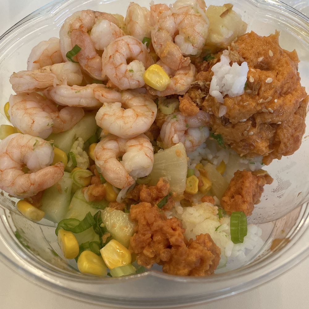 Poke bowl with inedible shrimp and spicy salmon mix. Poke bowl with inedible shrimp and spicy salmon mix.