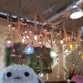 Urban Plates - Lights on the ceiling. The lamb is normally Not at the restaurant. - New American Near Me - Brea, California