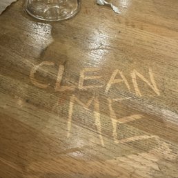 Every table top is this dirty, save yourself the bacteria and eat off the floor instead.