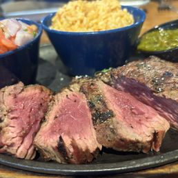 Steak with chimichurri beans rice.