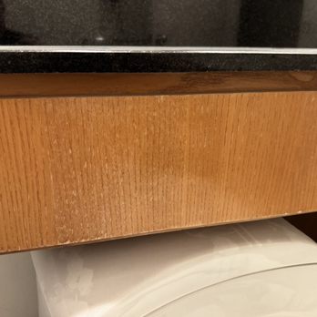 C&D Refinishings - Wood area before. Note the water spots and fading. - Refinishing Services Near Me