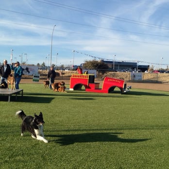 Willow Creek Dog Park - View of grass & fire truck. - Dog Parks Near Me - Prescott, Arizona