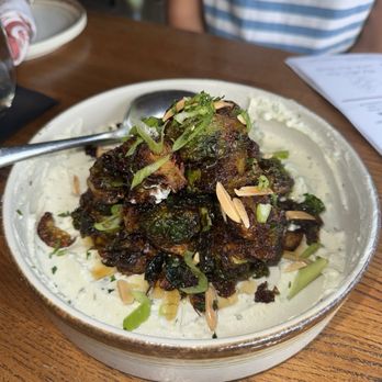 Enoteca Italia - Brussels sprouts served on top of a goat cheese spread. Will definitely be getting these again! - Italian Near Me - Dallas, Texas