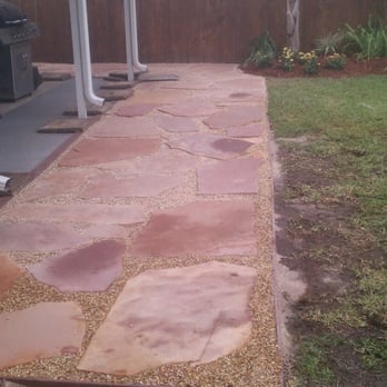 Exterior Expressions - a patio with flagstone pavers - Landscaping Near Me - Slidell, Louisiana Exterior Expressions - a patio with flagstone pavers - Landscaping Near Me - Slidell, Louisiana