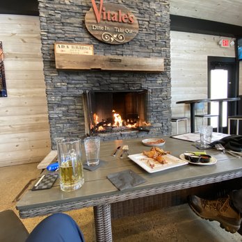 Vitale's of Ada - Awesome fireplace on a snowy day - Pizza Near Me - Ada, Michigan Vitale's of Ada - Awesome fireplace on a snowy day - Pizza Near Me - Ada, Michigan