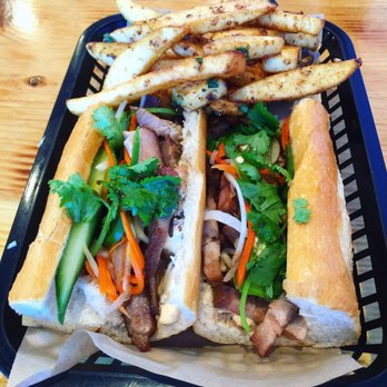 Blurr Kitchen - Roasted Pork Banh mi with garlic fries. - Asian Fusion Near Me - Santa Clara, California