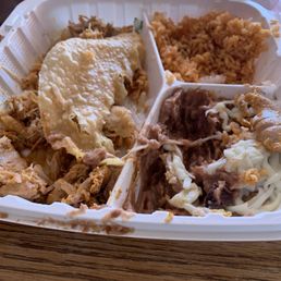 Hard shell chicken taco plate with rice and beans. Hard shell chicken taco plate with rice and beans.