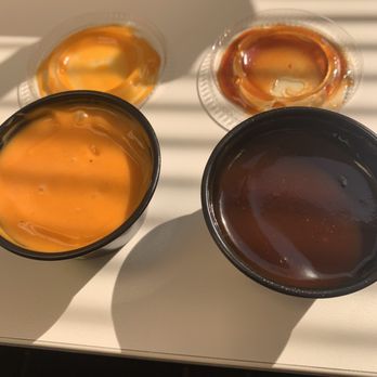 Buffalo Wild Wings - three bowls of sauces on a table - Chicken Wings Near Me - Orange, California