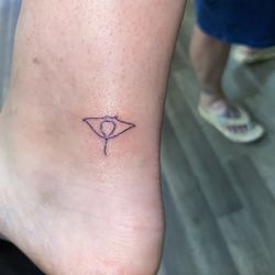 Lady Luck Tattoo & Body Piercing - Simple manta ray on ankle tattooed by Destiny!