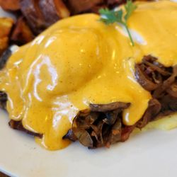 Frankie & Lola's Front Street Cafe - Eggs Benedict with mushrooms over grits