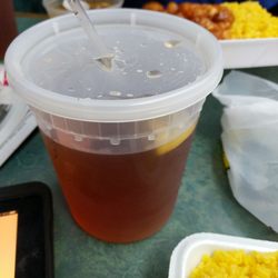 Peking Garden Restaurant - Sweet tea in large container.