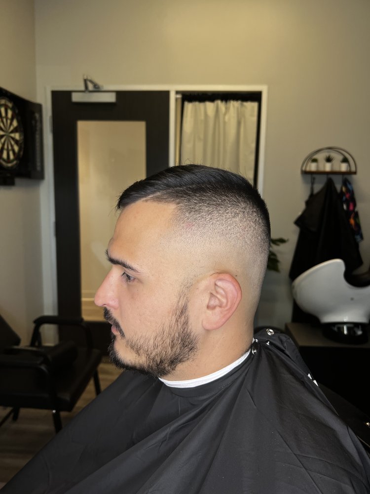 Sully’s Salon & Spa For Men Logo