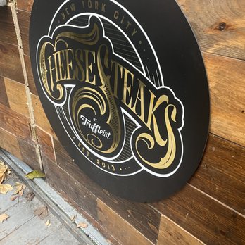Cheesesteaks by Truffleist - Sign on Kiosk - Cheesesteaks Near Me - New York, New York Cheesesteaks by Truffleist - Sign on Kiosk - Cheesesteaks Near Me - New York, New York