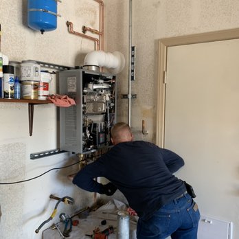 6-2 Plumbing - Installing a new tankless water heater in a garage - Plumbing Near Me 6-2 Plumbing - Installing a new tankless water heater in a garage - Plumbing Near Me