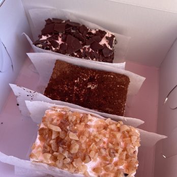 Dosa & Chaat Indian Cafe - Butterscotch cake (front), tiramisu (middle), Black Forest cake (back) all vegan - Indian Near Me - Gaithersburg, Maryland