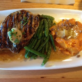 Applebee's Grill + Bar - Wood fired grille pork chop with honey Apple chutney - American Near Me - Hanford, California Applebee's Grill + Bar - Wood fired grille pork chop with honey Apple chutney - American Near Me - Hanford, California