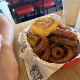 Hippo Burger with onion rings.