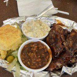 Auntie’s Tiendita & BBQ - Tender pork ribs, cornbread & sides of beans & potato salad.