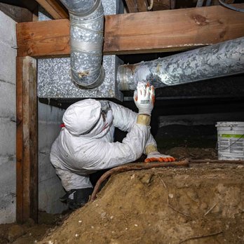 Northwest Crawl Space Services - Worker applying mastic paste to air duct joints - Insulation Installation Near Me - Arlington, Washington