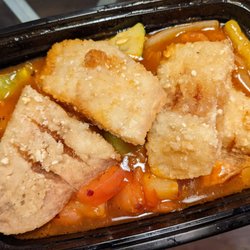 Siam Spicy4 - Deep-fried catfish with pineapples, green peppers, onions, and cucumbers in a sweet and sour sauce.