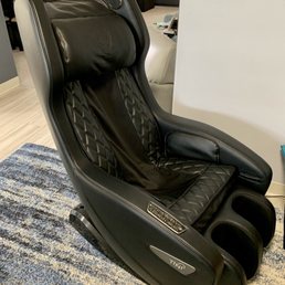 a massage chair in a living room a massage chair in a living room