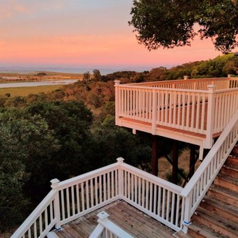 Miann Builders - a view of the ocean from a deck - General Contractors Near Me