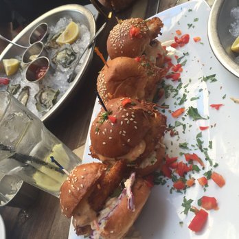 Rock'N Fish - Coconut crusted mahi sliders Comes order of 3. We added one more - Seafood Near Me - Manhattan Beach, California Rock'N Fish - Coconut crusted mahi sliders Comes order of 3. We added one more - Seafood Near Me - Manhattan Beach, California