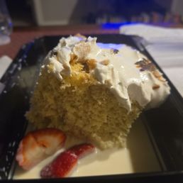 Not the prettiest but certainly one of the best tasting Tres Leches I've had Not the prettiest but certainly one of the best tasting Tres Leches I've had