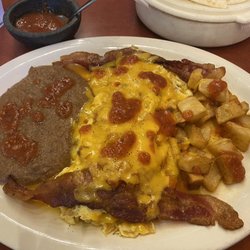 Memo's Mexican Restuarant & Bar - Migas ranch plate...