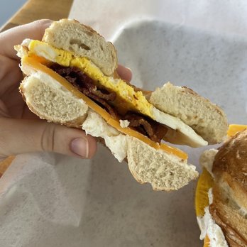 The Bagel Den - Bacon egg and cheddar cheese sandwich on a pretzel bagel. - Breakfast & Brunch Near Me - Provo, Utah