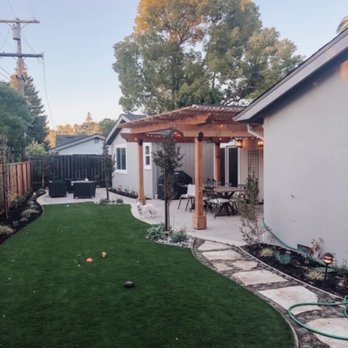 Arreola Landscape and Pool Design - Backyard - after (artificial turf and flagstone pathway) - Landscaping Near Me