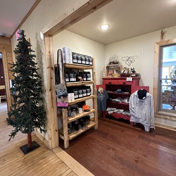 Northwoods Roasterie - a christmas tree in the corner of the room - Coffee Roasteries Near Me - Lindstrom, Minnesota