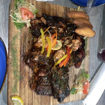 Dukunoo - DJK Platter sooo good : half rack of ribs, jerk chicken, jerk pork, plantain and festival ... We demolished this platter very tasty! - Caribbean Near Me - Miami, Florida Dukunoo - DJK Platter sooo good : half rack of ribs, jerk chicken, jerk pork, plantain and festival ... We demolished this platter very tasty! - Caribbean Near Me - Miami, Florida