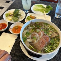 House Pho, lemonade and egg rolls. House Pho, lemonade and egg rolls.