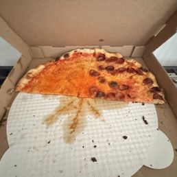 Half pep and cheese half eatten. Half pep and cheese half eatten.