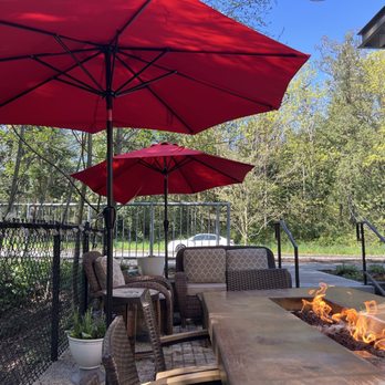 Blazing Onion Burger Company - Outside patio with the long fire pit - American Near Me - Newcastle, Washington