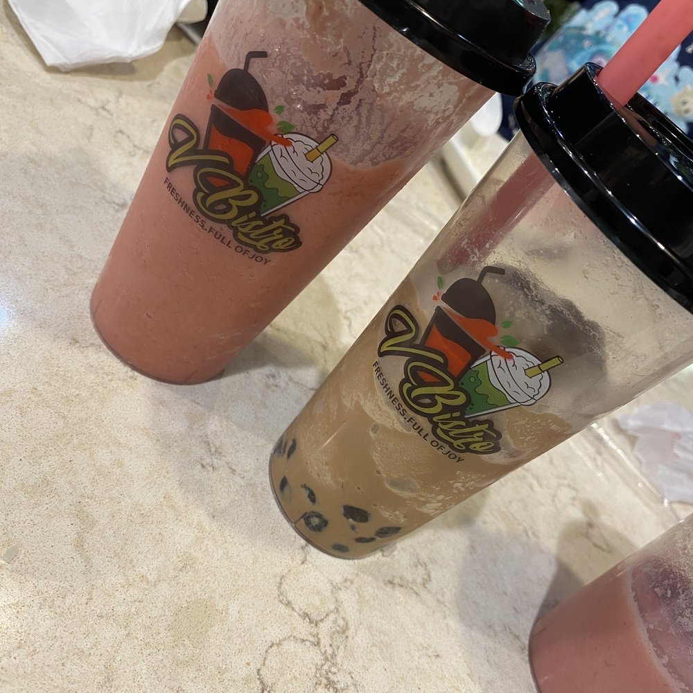 V Bistro - Strawberry smoothie on the left and coffee smoothie with boba on the right - Vietnamese Near Me - Conroe, Texas V Bistro - Strawberry smoothie on the left and coffee smoothie with boba on the right - Vietnamese Near Me - Conroe, Texas