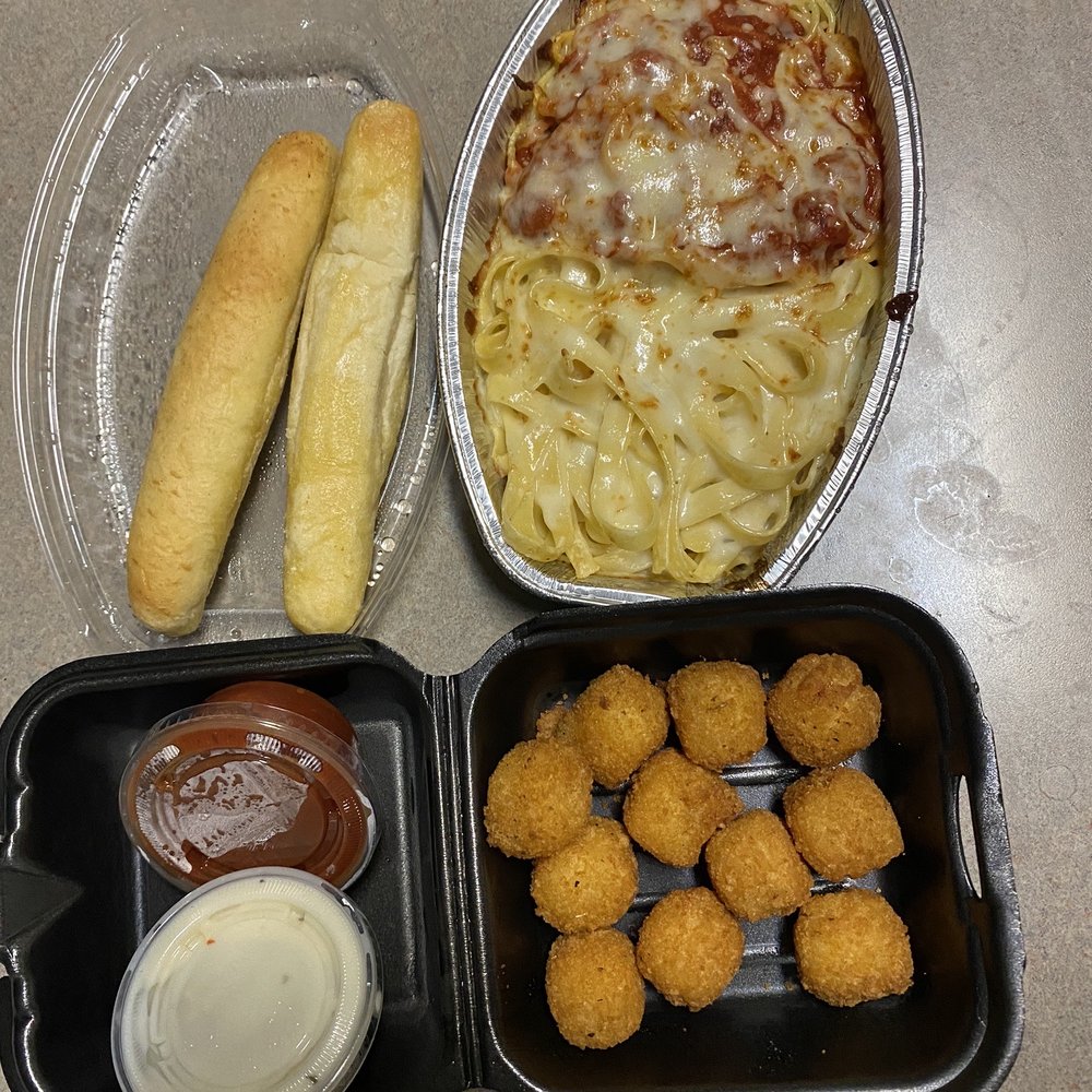 Fazoli's - 2 Breadsticks, Spaghetti and Fettuccine Alfredo Duo, cheese bites w/marinara and alfredo sauce - Italian Near Me - Memphis, Tennessee Fazoli's - 2 Breadsticks, Spaghetti and Fettuccine Alfredo Duo, cheese bites w/marinara and alfredo sauce - Italian Near Me - Memphis, Tennessee